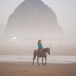 Woman Riding Horseback on a Foggy Day Near Haystack Rock 1