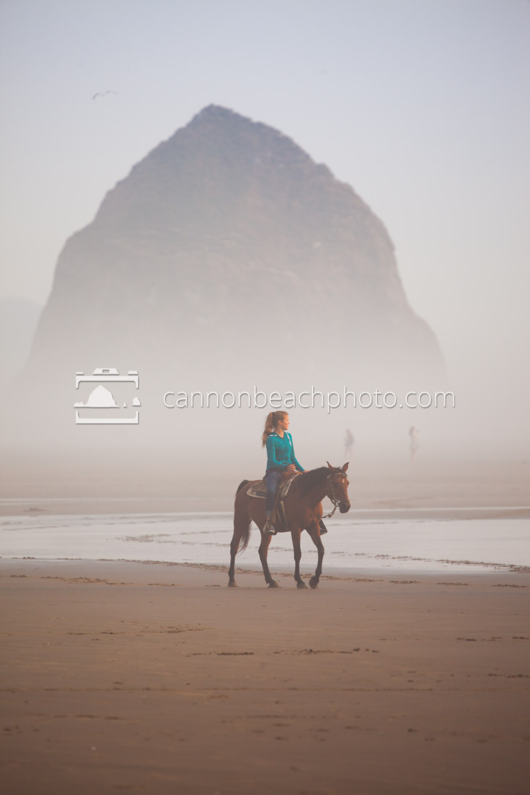 Woman Riding Horseback on a Foggy Day Near Haystack Rock 1
