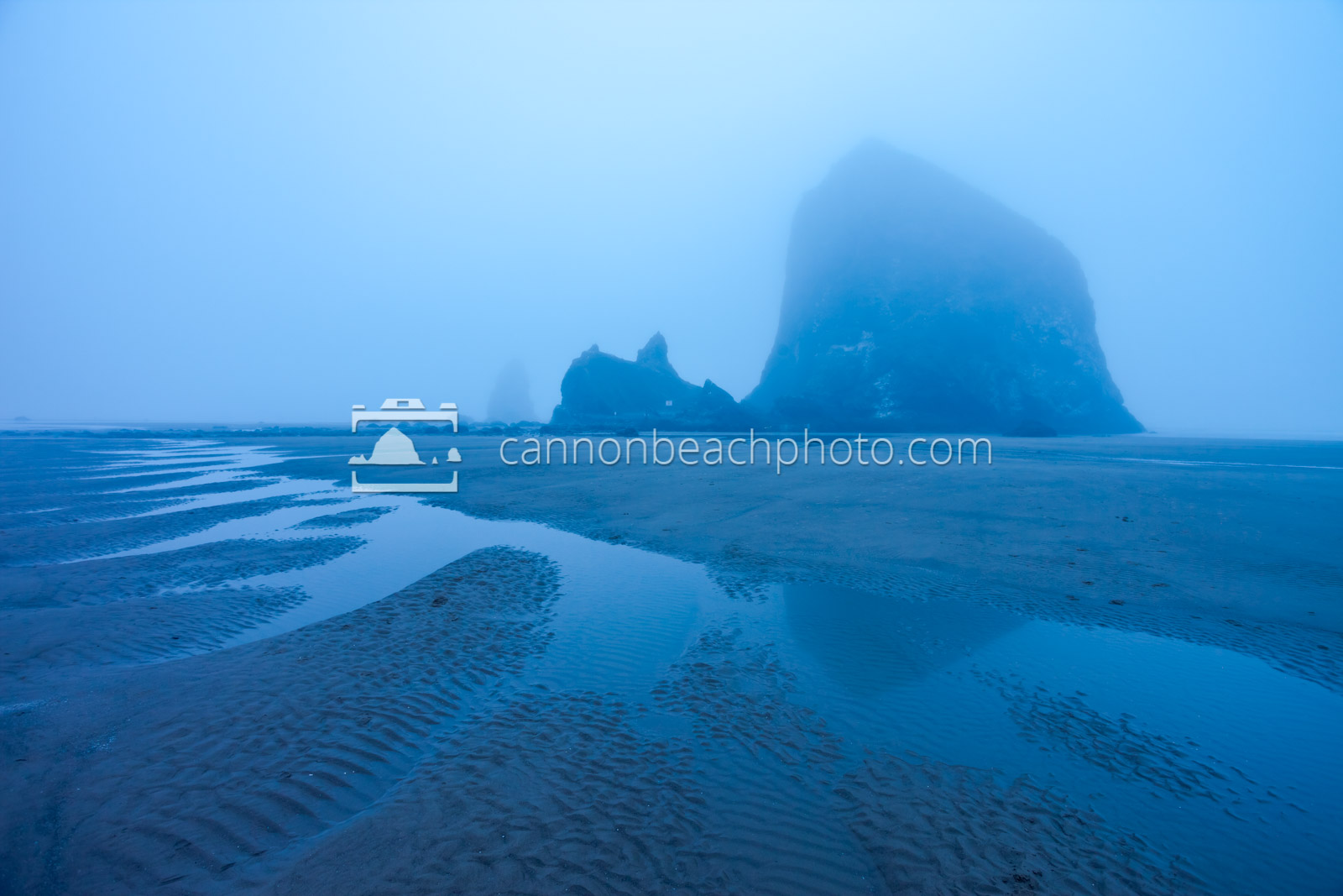 Haystack Rock in the Blue Fog