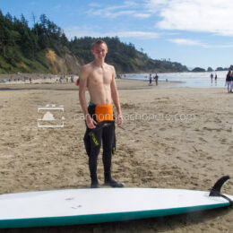 Young Man Preparing to Surf