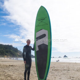 Young Man with Paddle Board