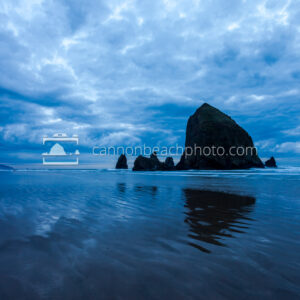 Wide View of Dynamic Blue Clouds Over Haystack Rock 1