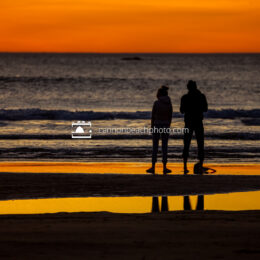 Silhouetted Couple in Yellow Sunset, Horizontal